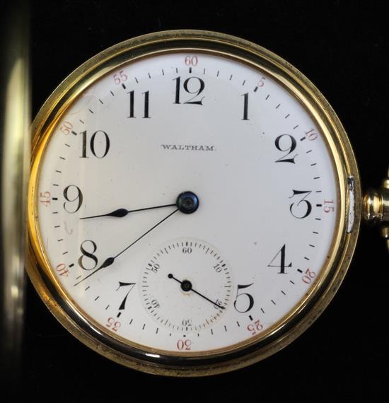 A George V 18ct gold Waltham keyless lever half hunter pocket watch,